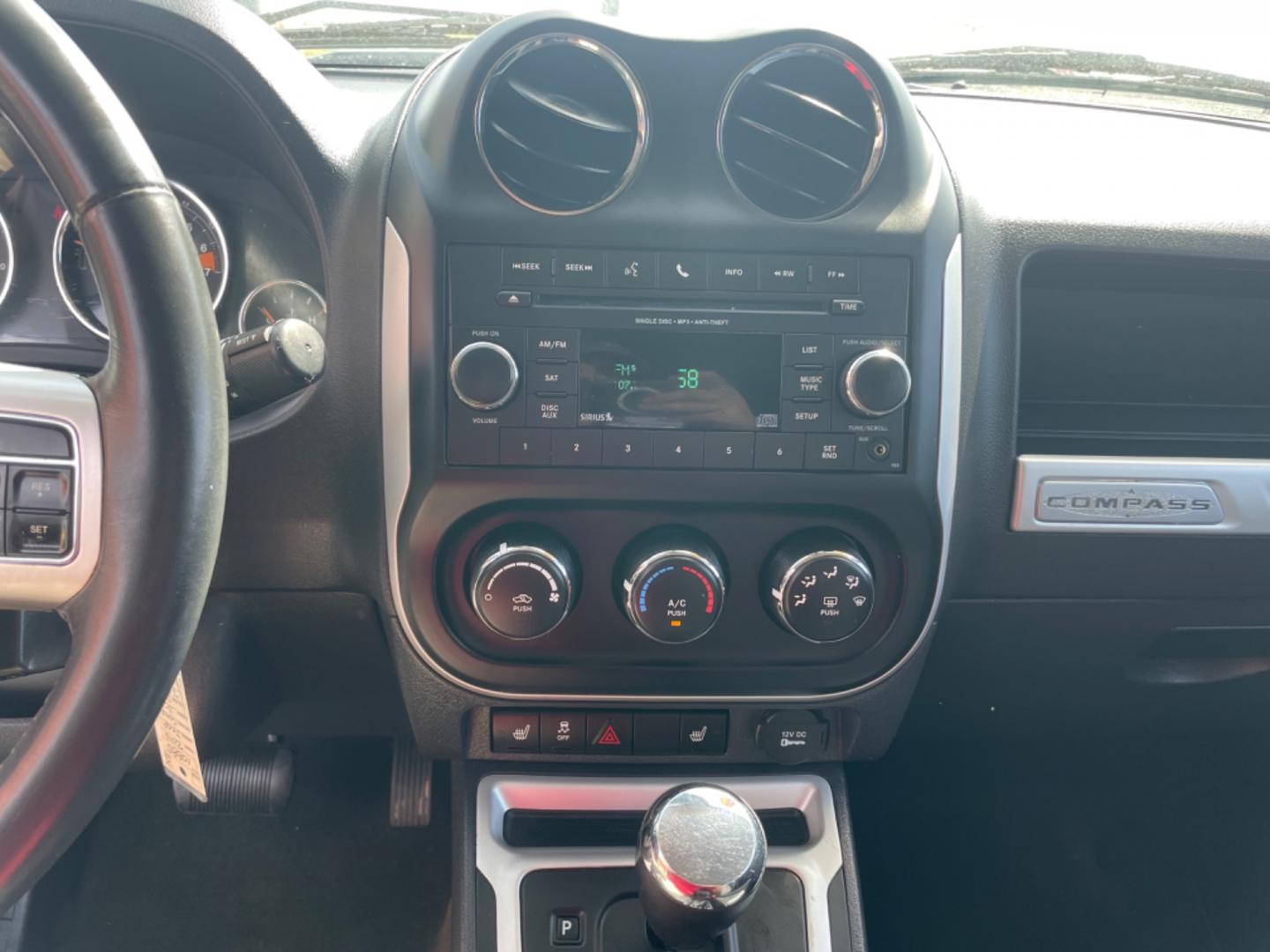 2016 Silver Jeep Compass (1C4NJCEA4GD) with an 4-Cyl, 2.0 Liter engine, Automatic, CVT transmission, located at 8008 Warden Rd, Sherwood, AR, 72120, (501) 801-6100, 34.830078, -92.186684 - Photo#15